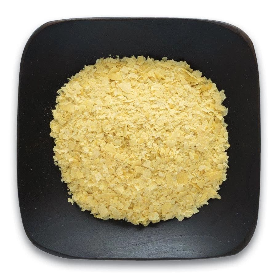 089836504074 frontier coop nutritional yeast mini flakes half pound 50407 bowl.jpeg